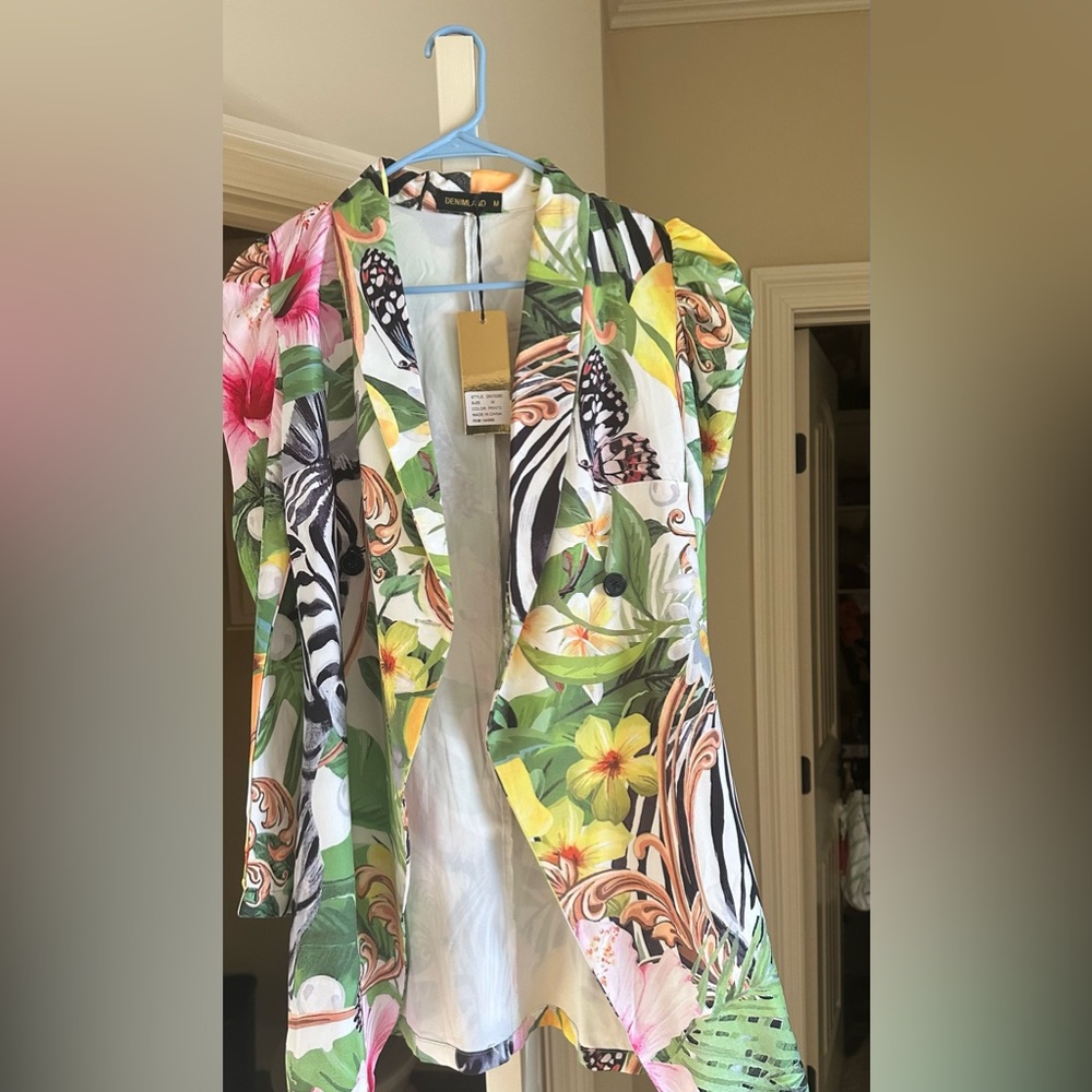 Brand new beautiful lightweight blazer.